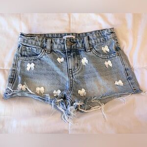 Tillys RSQ Bow Denim Cut Off Low Rise Shorts Light Wash Girls Kids size 10